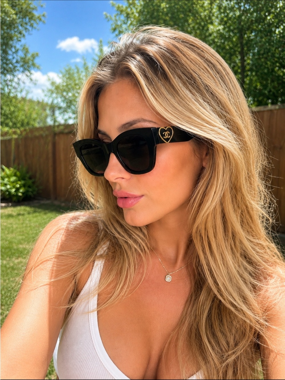 Chanel Black Cat-Eye Women's Sunglasses with Heart Accent